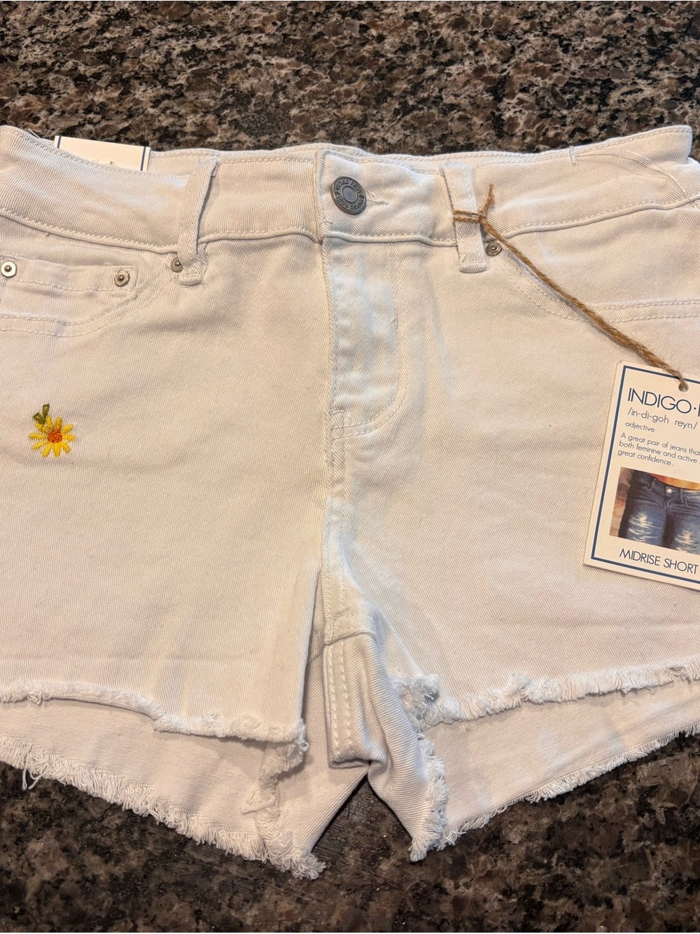 Indigo Rein White Midrise Frayed-Hem Jean Shorts with Floral Accent